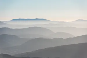 Calm Foggy Mountains Wallpaper