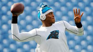 Cam Newton Throwing Football Wallpaper