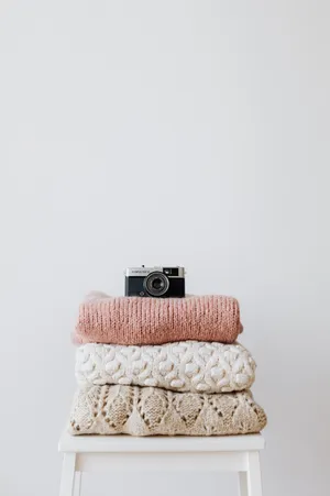 Camera Above Knitted Sweatshirt Wallpaper