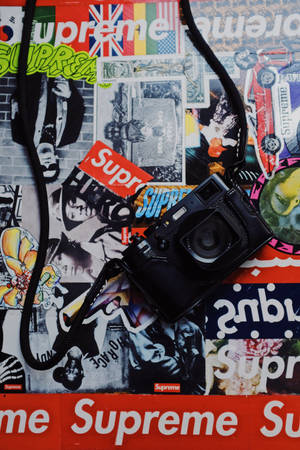 Camera On Superior Supreme Logo Collage Wallpaper