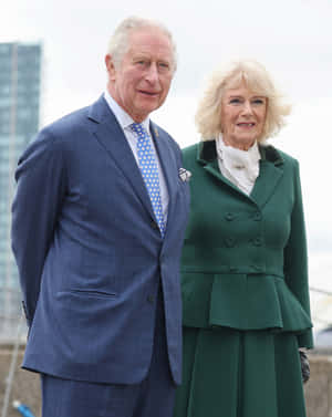 Camilla Standing Gracefully With Charles Wallpaper