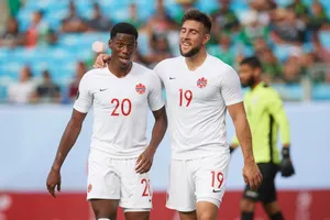 Canadian Soccer Players Celebration Wallpaper