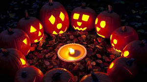 Candle With Scary Pumpkin Halloween Phone Wallpaper