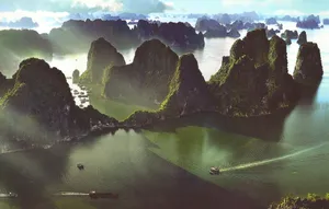 Caption: A Breathtaking View Of Halong Bay's Majestic Scenery Wallpaper