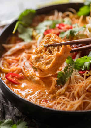 Caption: A Close-up Look At Delicious Curry Laksa Wallpaper