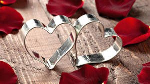 Caption: Adorable Heart-shaped Metal Trinket Close Up Wallpaper