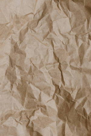 Caption: Aesthetic Crumpled Brown Cardboard Paper Wallpaper