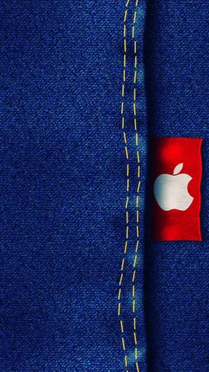 Caption: Apple Logo On Classic Denim Fabric Wallpaper