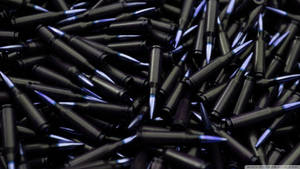 Caption: Artistic Display Of Dark Purple Bullets Wallpaper