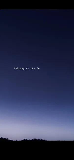 Caption: Basking In The Lunar Glow - A Visual Depiction Of Moon Quotes Wallpaper