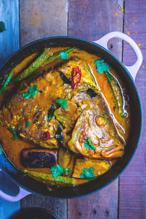 Caption: Captivating Flat-lay Shot Of Spicy Fish Head Curry Wallpaper