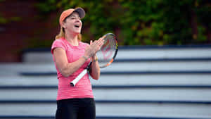 Caption: Chris Evert Mindful Moment On Court Wallpaper