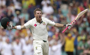 Caption: David Warner Expresses Intensity On The Field Wallpaper