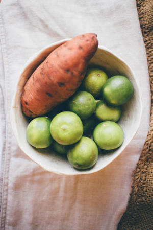 Caption: Delicious Sweet Potato With Zesty Citrus Twist Wallpaper