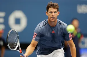 Caption: Dominic Thiem - Focused Tennis Star In Action Wallpaper