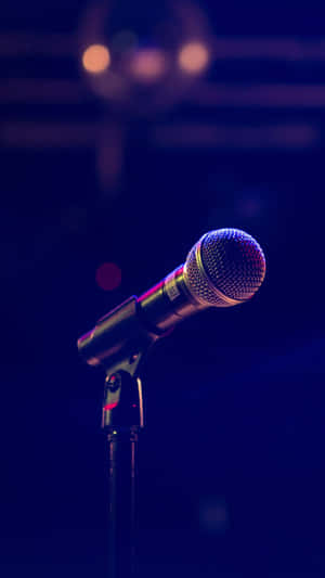 Caption: Dynamic Microphone Ready For Performance Wallpaper