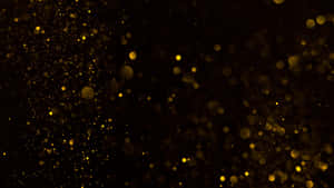 Caption: Elegance Resonated - Black And Gold Glitter Wallpaper Wallpaper