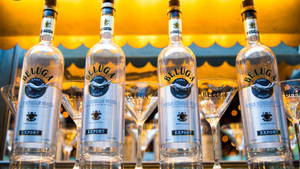 Caption: Exquisite Row Of Beluga Noble Russian Vodka Bottles. Wallpaper