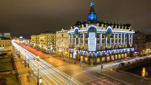 Caption: Iconic Singer Café Building In The Heart Of Saint Petersburg Wallpaper