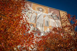 Caption: Iconic Touchdown Jesus Mural At The University Of Notre Dame Wallpaper