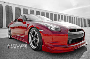 Caption: Immaculate Nissan Skyline Gt-r R35 In Stunning Red Wallpaper