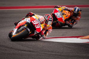 Caption: Intense Motogp Race With Marquez And Pedrosa Wallpaper