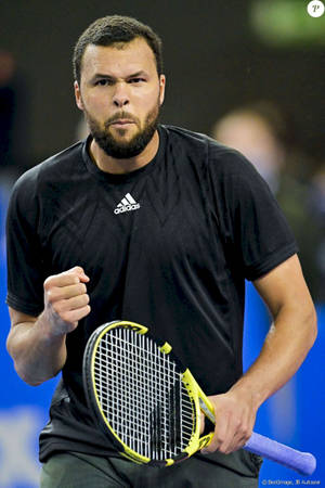 Caption: Jo-wilfried Tsonga Celebrating Victorious Moment Wallpaper