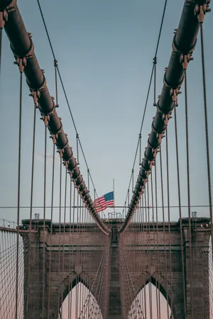 Caption: Majestic Display Of The American Flag Wallpaper