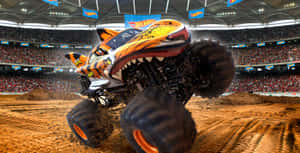 Caption: Majestic Monster Truck In Action Wallpaper