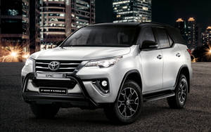 Caption: Majestic Toyota Fortuner In Super White Color Wallpaper