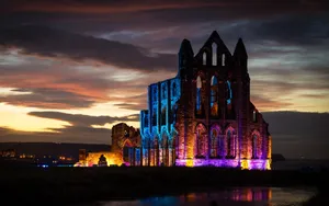 Caption: Majestic View Of Whitby Abbey In Yorkshire Wallpaper
