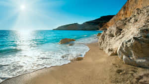 Caption: Mesmerizing View Of The Mediterranean Sea Coast Wallpaper