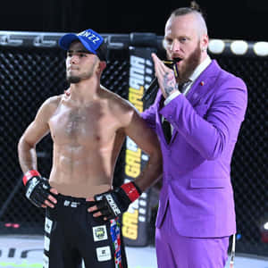 Caption: Mma Fighter Muhammad Mokaev Entering The Stage Wallpaper