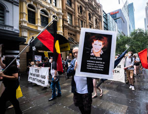 Caption: Non-binary Individuals Expressing Support In A Rally Wallpaper