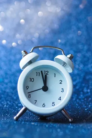 Caption: Off-white Vintage Alarm Clock Wallpaper