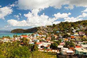 Caption: Pristine Beachside Living In St. Lucia Wallpaper