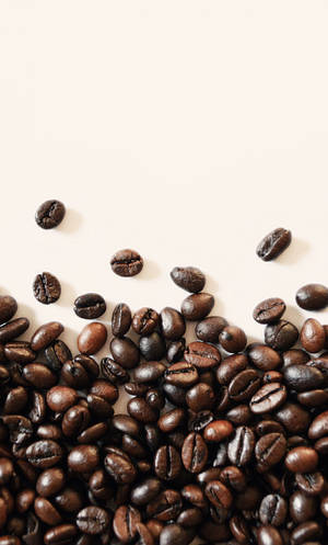 Caption: Quality Dark Roasted Coffee Beans Wallpaper