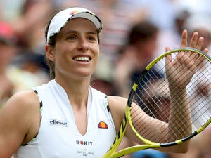 Caption: Radiant Smile Of Johanna Konta On Court Wallpaper