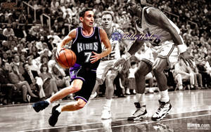 Caption: Sacramento Kings In Action On The Home Court Wallpaper