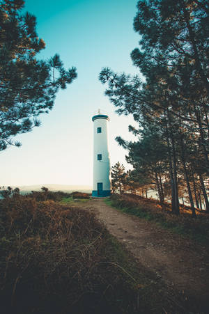 Caption: Samsung Galaxy S7 Edge Capturing Stunning Lighthouse Scenery Wallpaper