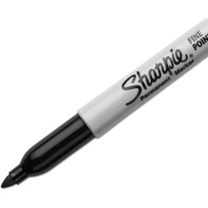 Caption: Sharpie Permanent Marker On White Background Wallpaper
