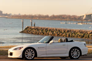 Caption: Sleek White Convertible Honda S2000 Wallpaper