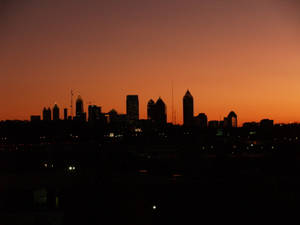 Caption: Spectacular Atlanta Skyline Silhouette At Twilight. Wallpaper