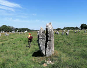 Caption: Stunning View Of Cracked Monolith In Carnac, France Wallpaper