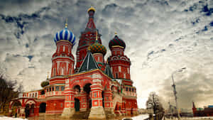 Caption: The Majestic Saint Basil's Cathedral Under An Overcast Sky. Wallpaper