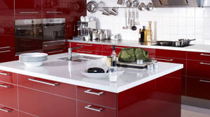 Caption: Vibrant Red And White Modern Kitchen Design Wallpaper