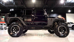 Captivating Black Jeep Wrangler In The Wild Wallpaper