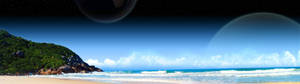 Captivating Dual Monitor Display Of Beach Skies Wallpaper