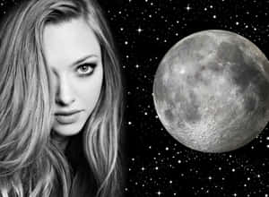 Captivating Image Of A Star Shining In The Monochrome Sky Wallpaper