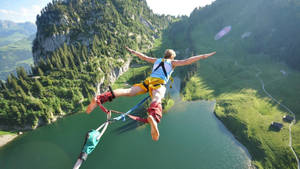 Captivating Leap Of Faith In Extreme Sports: Bungee Jumping Wallpaper